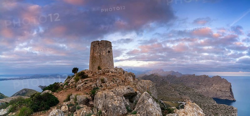 A view of the Albercutx watchtower at Cap de Formentor in northwestern Mallorca at sunrise