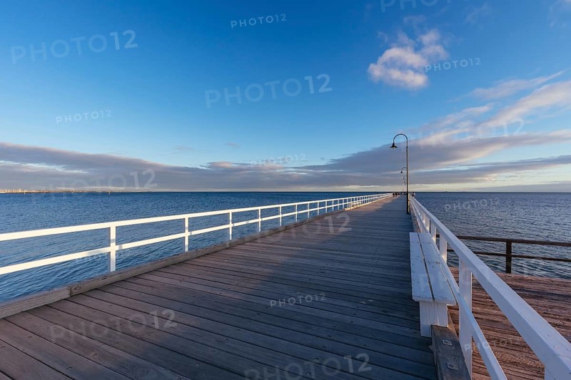 Kerford Rd Pier and Albert Park Yachting Angling Club in Albert Park at sunset on a winter's evening in Melbourne, Victoria, Australia, Oceania