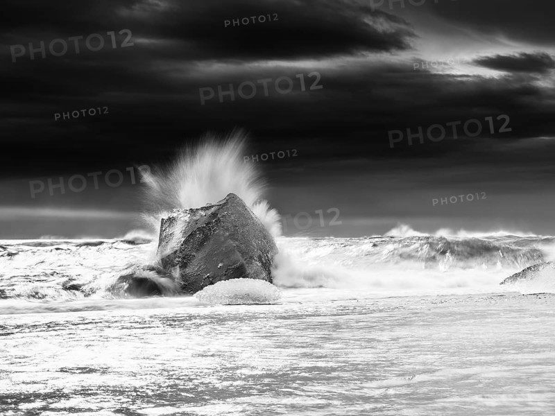 Diamond Beach, iceberg in the surf, near Jökulsarlon glacier lagoon, Vatnajökull National Park, Hornafjörður, South Iceland, Iceland, Europe
