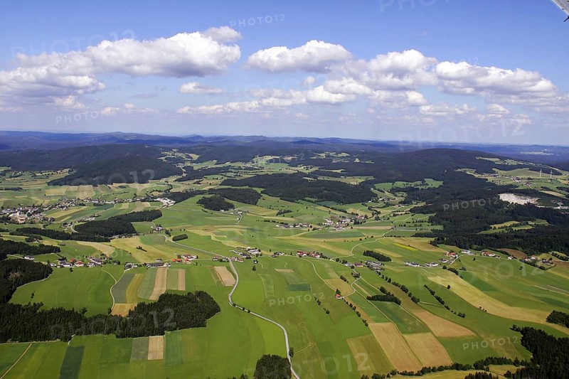 Landscape shot from an aeroplane. Meadows, fields and farmland Austria