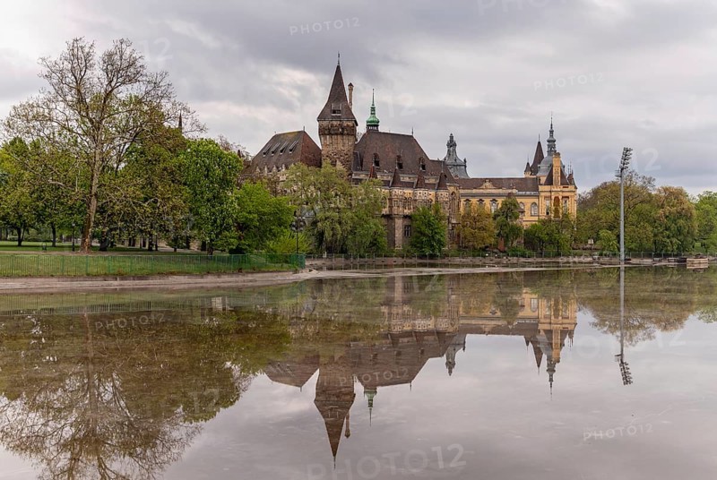 A picture of the Vajdahunyad Castle reflected on the City Park Lake
