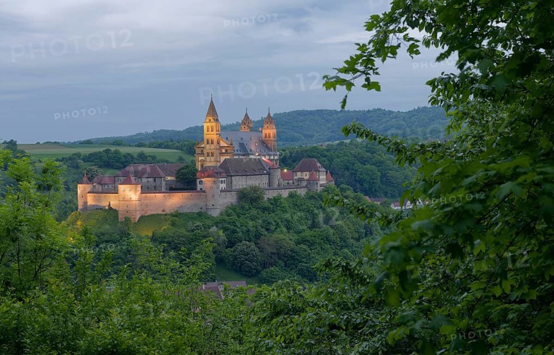 View of Comburg Castle at dusk, Benedictine monastery, Way of St James, Hohenlohe, Baden-Württemberg, Germany, Europe