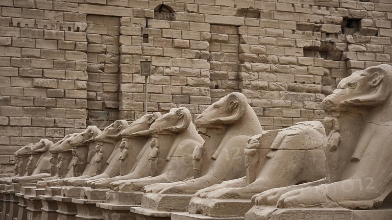 Avenue of ram-headed sphinxes. The Karnak Temple Complex, Luxor, Upper Egypt. UNESCO World Heritage Site