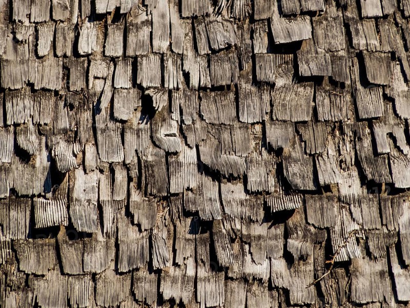 The roof of a very old house was covered with wooden shingles. Austria