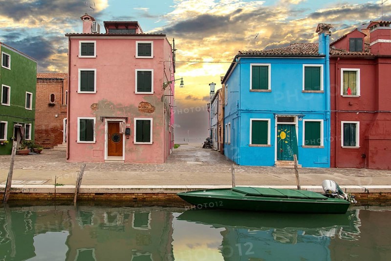 Colorful Houses in Burano beneath a scenic sky, Island of Venice, Italy, Europe