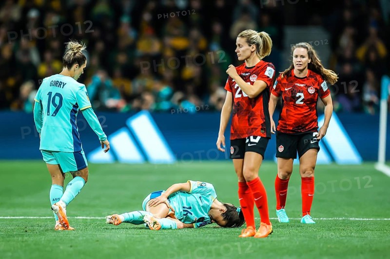 MELBOURNE, AUSTRALIA, JULY 31: Hayley RASO of Australia goes down injured as Australia plays Canada at the FIFA Women's World Cup Australia New Zealand 2023 at Melbourne Rectangular Stadium on July 31, 2023
