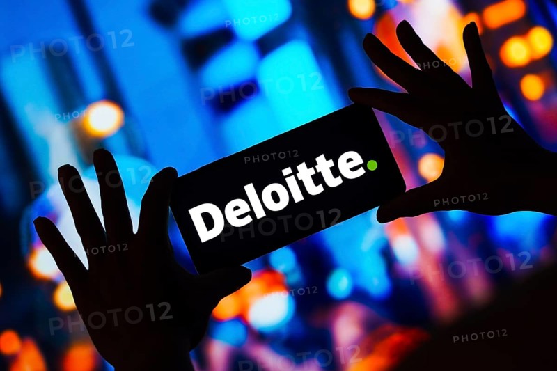 In this photo illustration, the Deloitte Touche Tohmatsu Limited logo is displayed on a smartphone screen