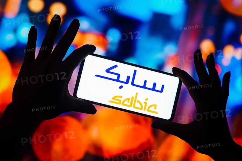 In this photo illustration, the SABIC logo is displayed on a smartphone screen