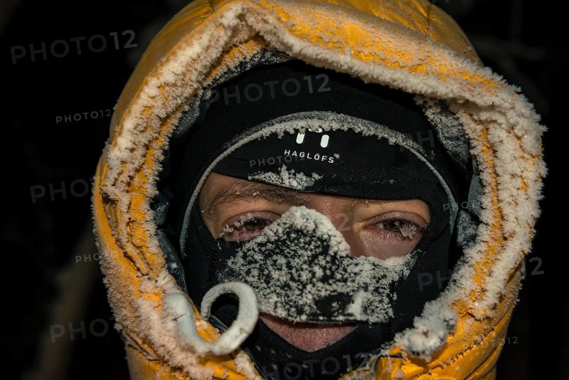 Man with frost-covered hood and balaclava, Abisko, Norrbotten, Lapland, Sweden, December 2012, Europe