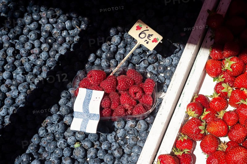 23/06/2018, Helsinki, Finland, Europe, Fresh blueberries, raspberries and strawberries are offered at a market stall, Europe