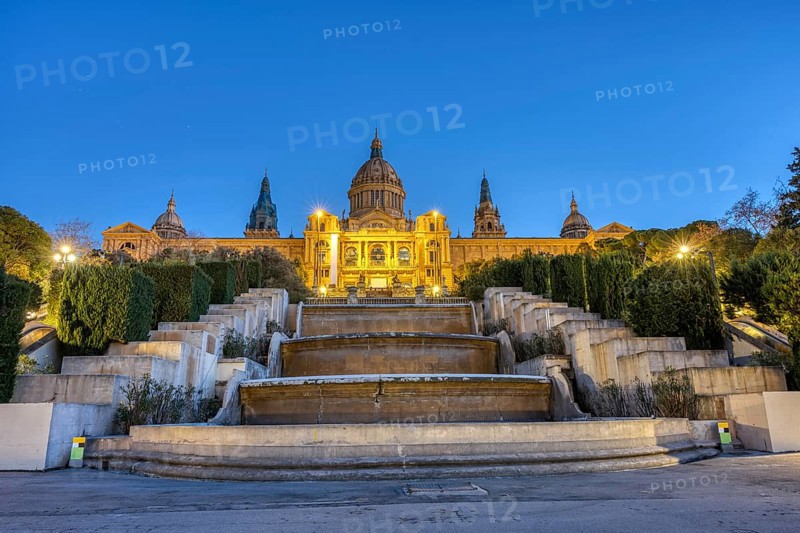 The National Palace on the Montjuic hill in Barcelona illuminated at dusk