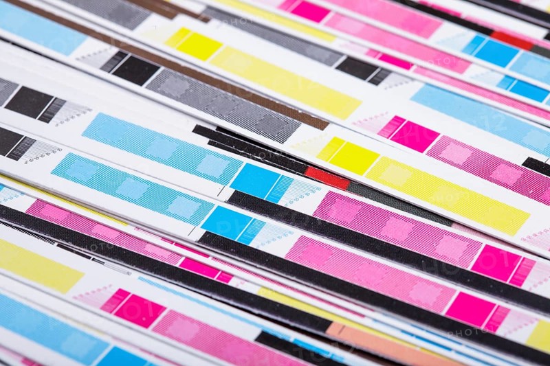 CMYK color on printed sheets of paper after cutting