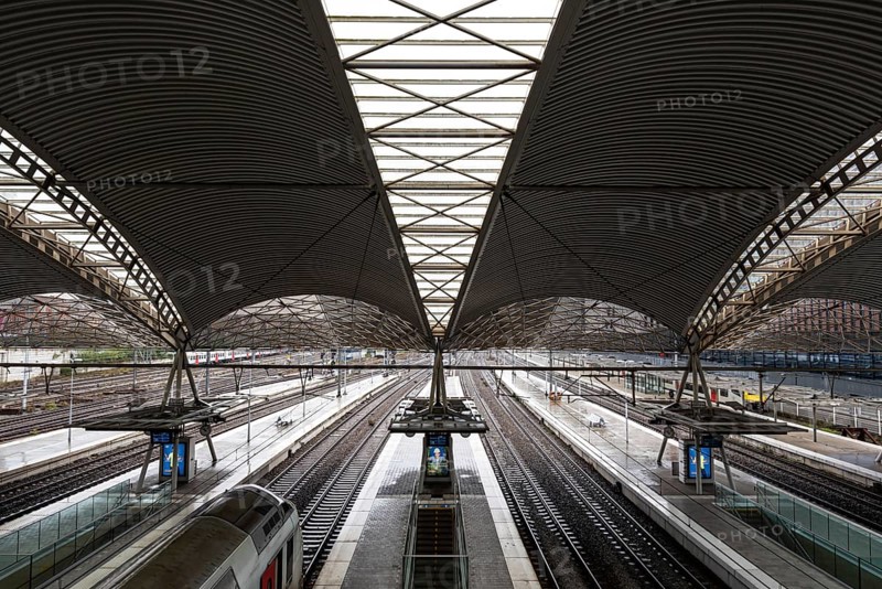 Leuven, Flemish Brabant Region, Belgium 10 31 2021: High angle view over the ceiling, platform and rails of the train station