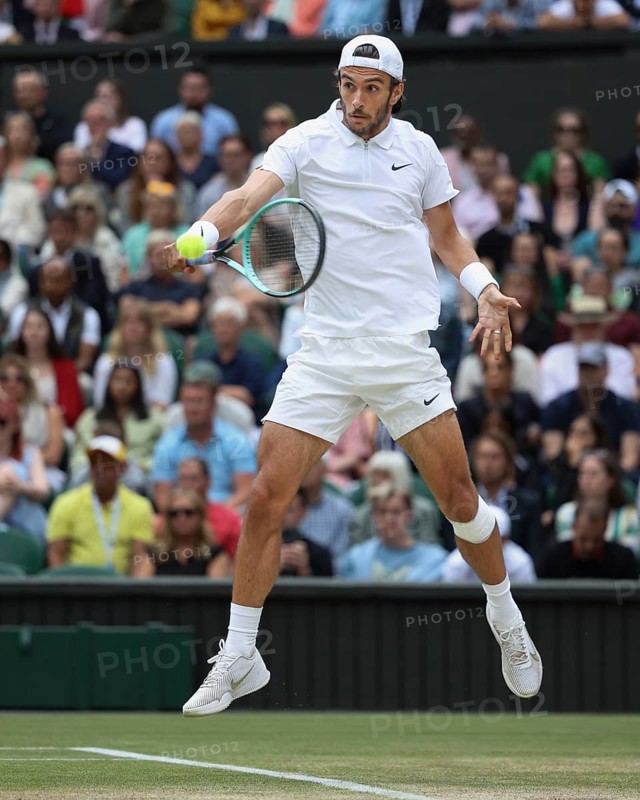 Italian tennis player Lorenzo Musetti in action at the 2024 Wimbledon Championships, London, England, United Kingdom, Europe