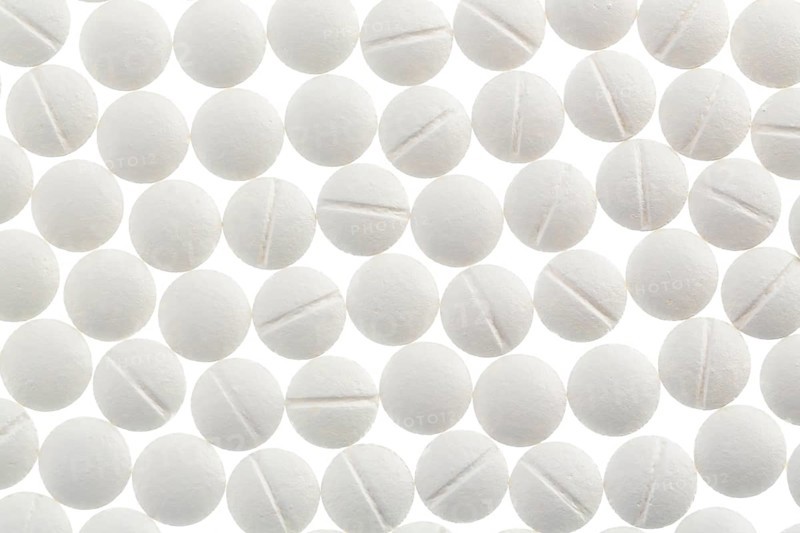 White tablets, symbolic photo for medicine, remedies and tablet addiction