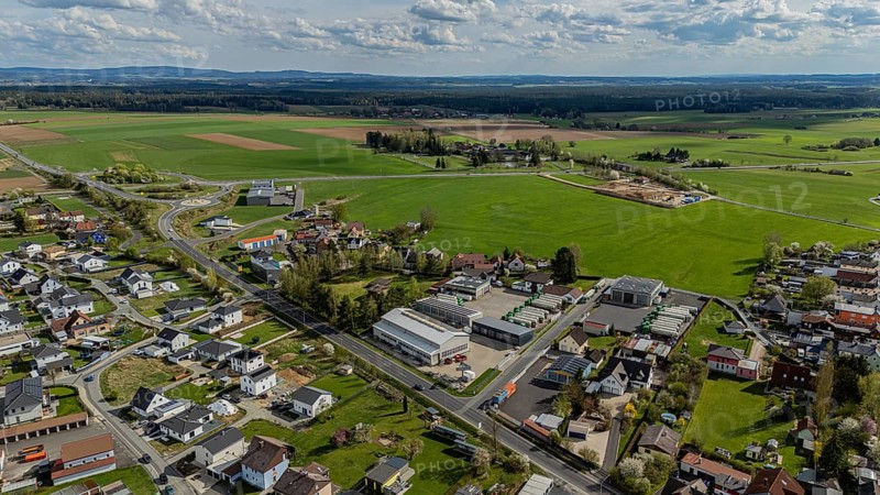 Aerial view of a village with houses, streets and fields under a slightly cloudy sky, Mitterteich, Upper Palatinate, Bavaria, Germany, Europe