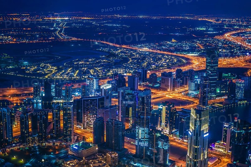 Dubai night view seen from the observation deck of Burj Khalifa. Shooting Location: Dubai