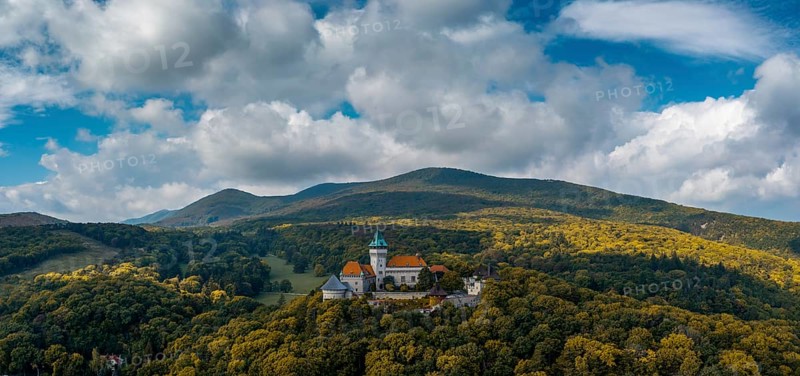 Smolenice, Slovakia, 26 September, 2022: panorama landscape of Smolenice Castle in the Little Carpathians in early autumn with fall foliage colors, Europe