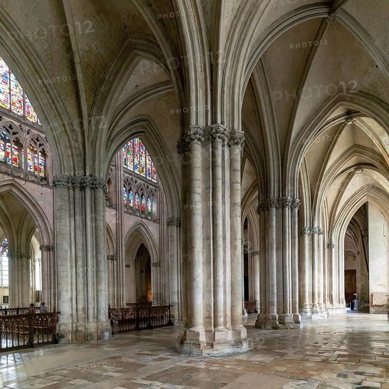 Troyes, France- 13 September, 2022: interior view of the Troyes Cathedral with side and central nave and stained glass windows