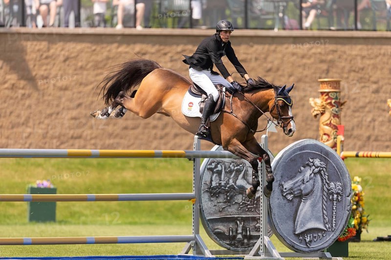 Vaclav Stanek from Czechoslovakia, and riding Quintin, compete in the 1.60m Grand Prix during The Continental international competition at Spruce Meadows, in Calgary, Canada, North America