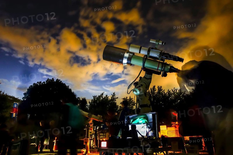 Image of astronomical observations at the telescope. Shooting Location: Tokyo metropolitan area