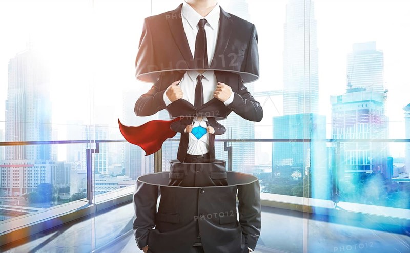 Businessman in suit transform to super hero from layer to layer, hard work and successful businessman concept