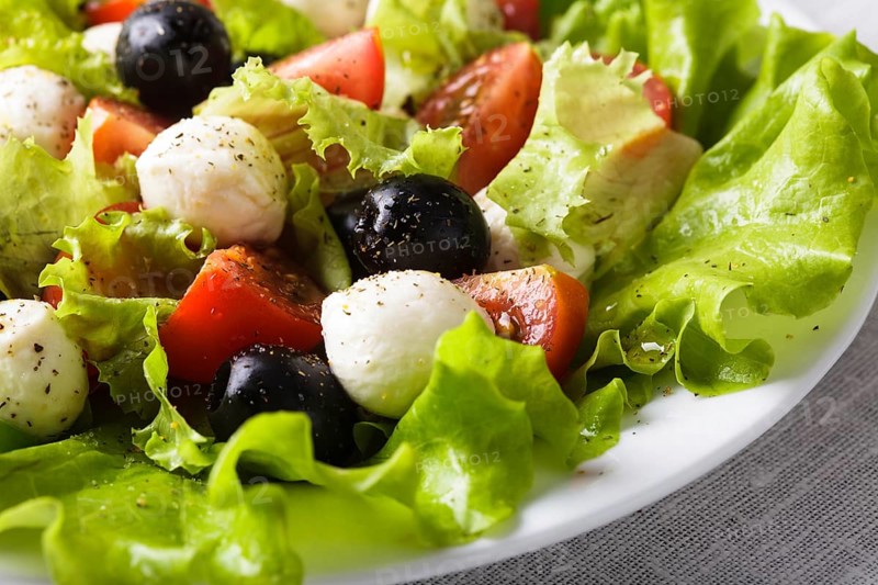 Fresh salad with mozarella cheese and vegetables