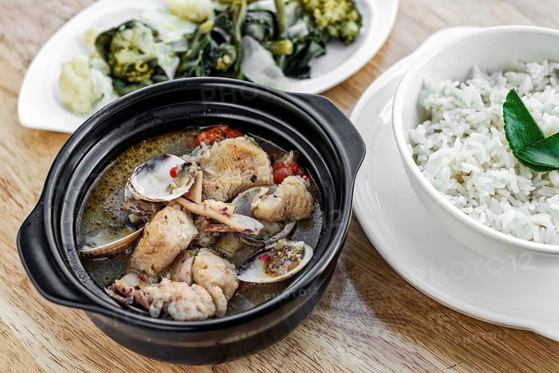 Traditional fish clams and mixed seafood portuguese spicy soup stew meal