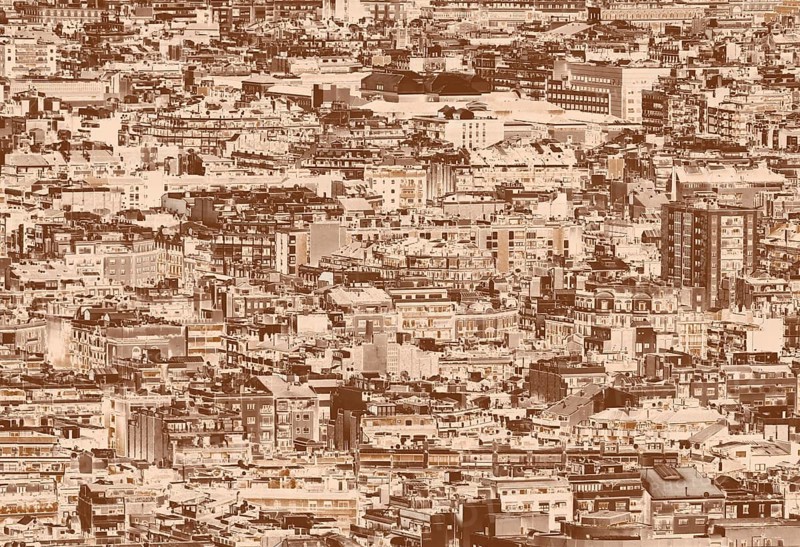 A sepia duotone crowded urban cityscape background with hundreds of densely packed buildings