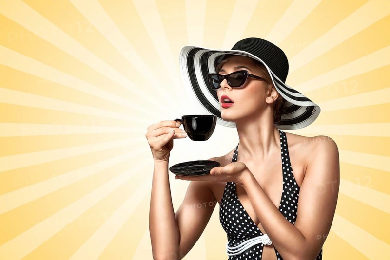 A creative vintage photo of a beautiful pin up girl drinking tea and showing good table manners on colourful abstract cartoon style background