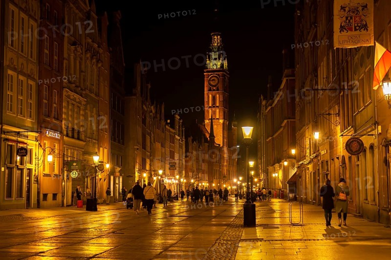 Gdansk Poland, May 2022 View of Dlugi Targ and Dluga Street in Old Town at night. Main Town Hall at night. Gdansk is the historical capital of Polish Pomerania. Famous Long Lane street in the Gdansk old city at night, Poland. Travel tourist destination. Visit Gdansk