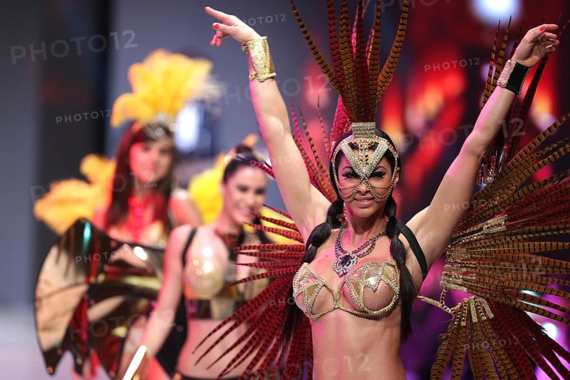 Sofia, Bulgaria - March 23, 2016: Sexy female performers are dancing at the runway at Sofia Fashion Week Show in colorful and exotic costumes