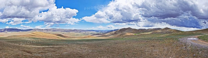 Panorama of Mongolian landscape with road and mountains