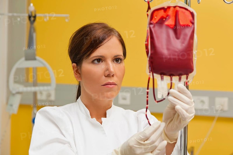 A nurse in a clinic with a blood bank. Infusion of donated blood. Austria