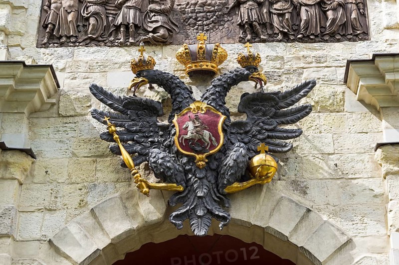 Saint Petersburg, Russia, June 12, 2019: Small State Coat of Arms of the Russian Empire on the wall above the gates of the Peter and Paul Fortress. Saint Petersburg, Russia, Europe