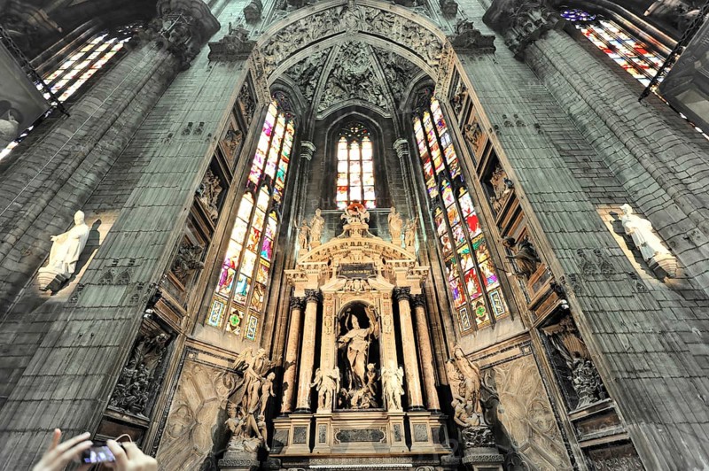 Milan Cathedral, Duomo, construction started in 1386, completed in 1858, Milan, Milano, Lombardy, Italy, Europe, Magnificent Gothic cathedral with an impressive altar flanked by stained glass windows and sacred statues, Europe