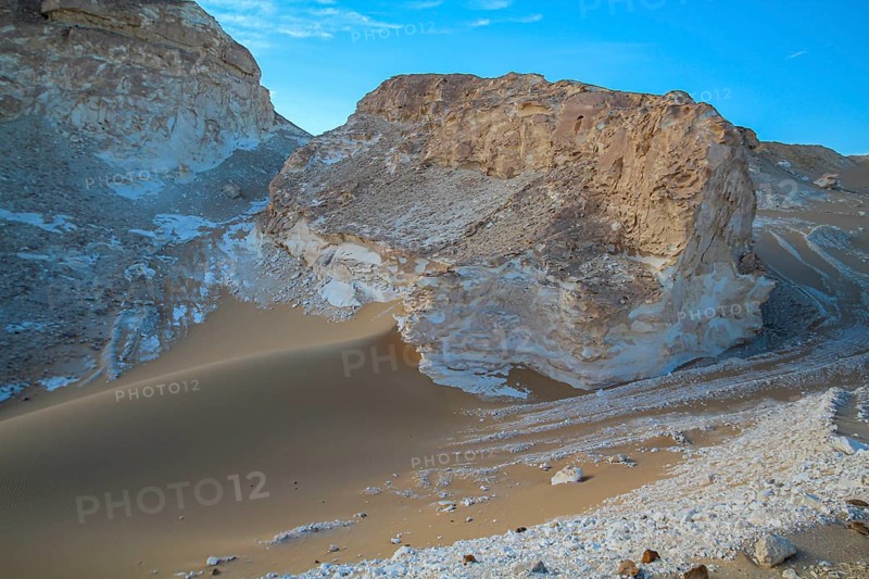 Late afternoon sun casting shadows on rocks in the Libyan desert white desert, Farafra, Egypt, Africa