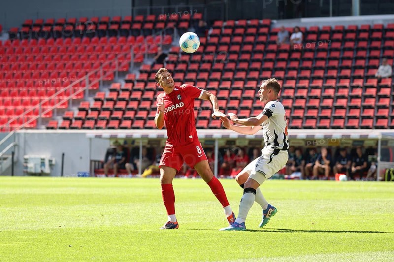 Maximilian Eggestein (SC Freiburg) wins the header duel against Fabian Frei (FC Basel) during the football test match: SC Freiburg - FC Basel REGULATIONS PROHIBIT ANY USE OF PHOTOGRAPHS AS IMAGE SEQUENCES AND/OR QUASI-VIDEONan Photo: Joachim Hahne/johapress, Freiburg, Germany / Germany
