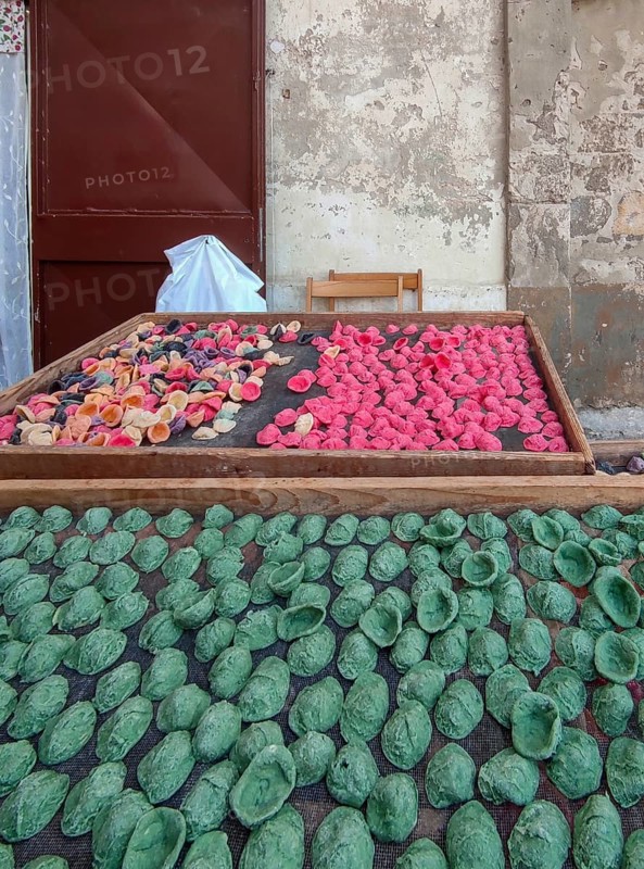 Colourful fresh pasta orecchiette for sale, Bari, Apulia, Southern Italy, Italy, Europe