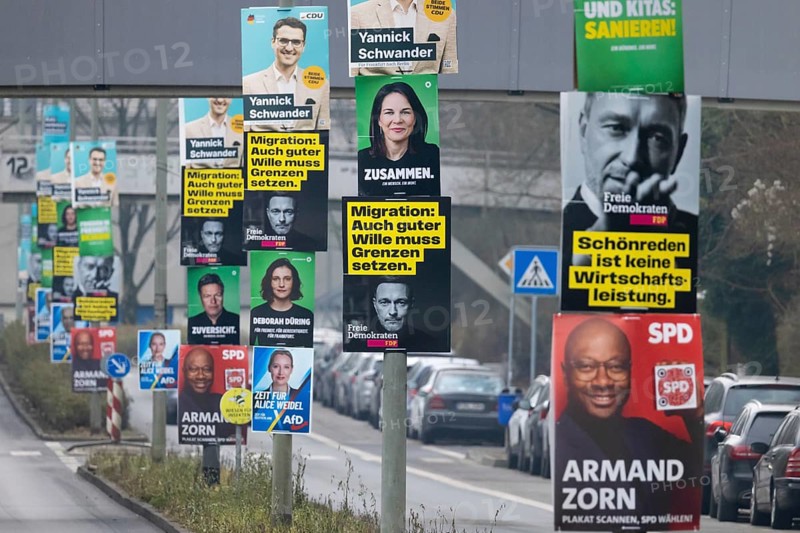 Election posters of the established parties CDU, AfD, Bündnis 90, Die Grünen, SPD and FDP hang on several lampposts in the north-west of Frankfurt. The early federal election will take place in Germany on 23 February 2025, Nordweststadt, Frankfurt am Main, Hesse, Germany, Europe