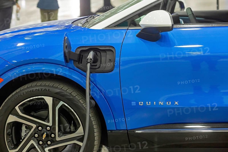 Detroit, Michigan USA - 10 January 2025 - The Chevrolet Equinox EV, plugged into a charging station at the 2025 Detroit Auto Show