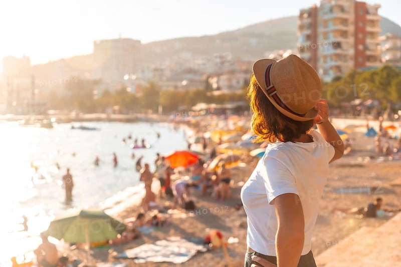Portrait of a tourist woman at sunset in Sarande or Saranda on the Albanian riviera, Albania, Europe