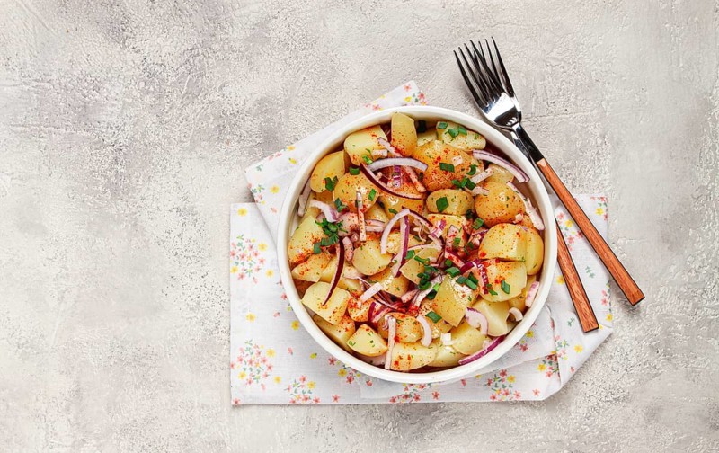Boiled potato salad with red onion, German cuisine, homemade, no people
