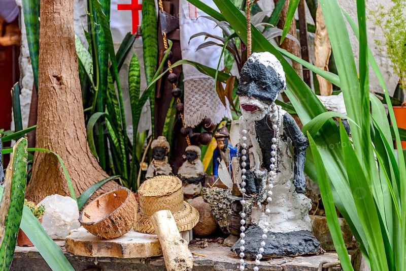 Afro-Brazilian religious altar with Umbanda objects and entities among plants, Belo Horizonte, Minas Gerais, Brazil, South America