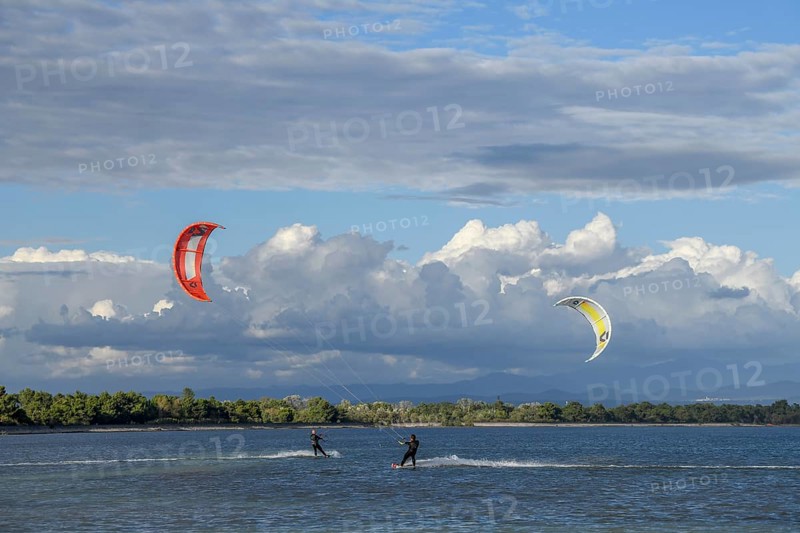 Kite surfers on Grado Pineta beach, Grado island, Friuli Venezia Giulia region, Italy, Europe