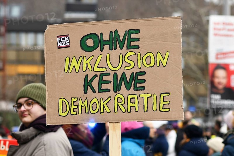 Heidelberg, Germany - February 12th 2025: Sign with text saying 'without inclusion there is no democracy' at protest against far-right