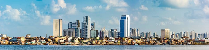 Panoramic image of the city of Recife in Pernambuco with the river and the favela in the foreground and the buildings behind, Recife, Pernambuco, Brazil, South America