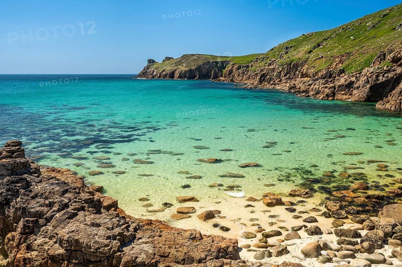 Coastal landscape. sandy beach beach and rocks in Nanjizal Bay or Nanjizal Beach. St Just, Penzance, Cornwall, England, Great Britain