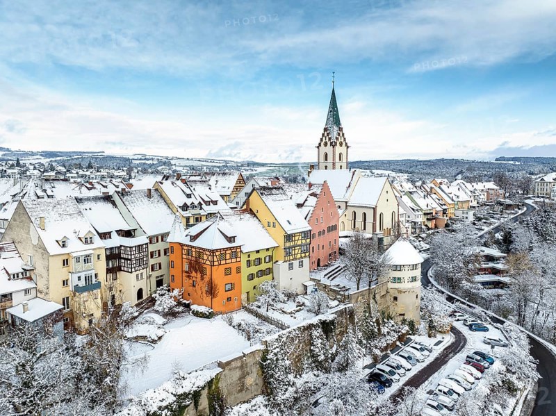 Aerial view of the snow-covered town of Engen in Hegau on a winter morning with the Church of the Assumption of the Virgin Mary in the old town centre, Constance district, Baden-Württemberg, Germany, Europe