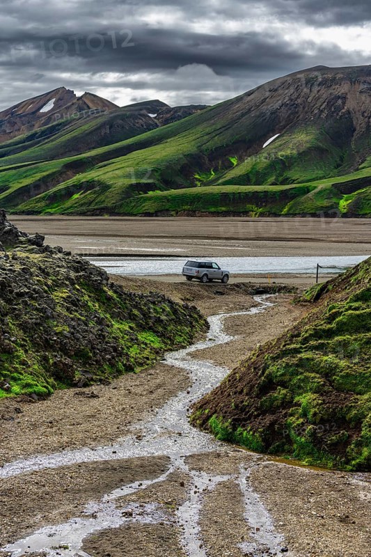 Off-road vehicle in volcanic landscape, Moss-covered mountains, Rhyolite mountains, Volcanic landscape, Landmannalaugar, Fjallabak nature reserve, Icelandic highlands, Suðurland, Iceland, Europe
